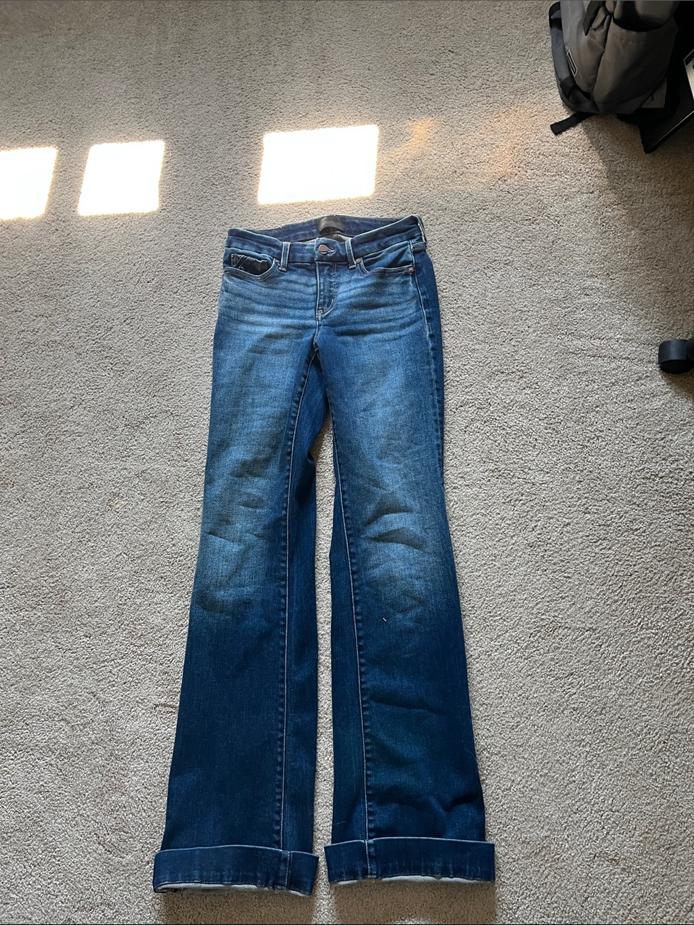 Buckle Dark Blue Flare Jeans with Rolled Hem